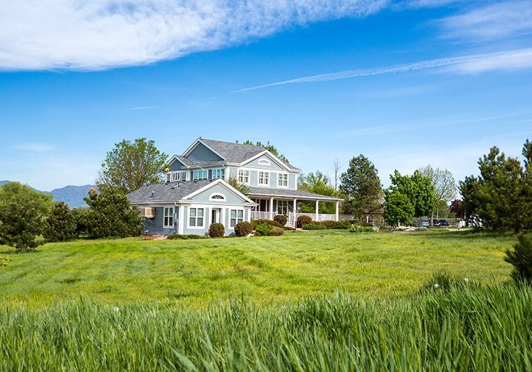 Big wooden house surrounded by nice nature